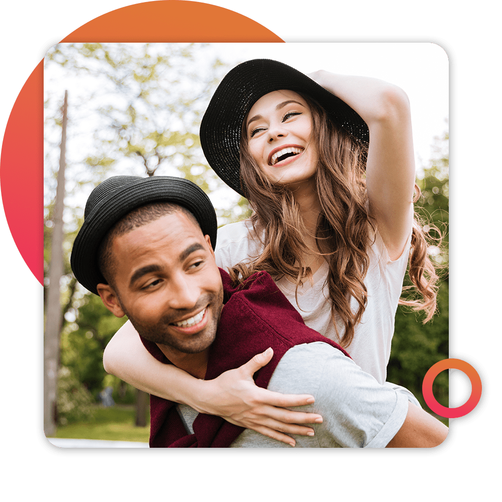 couple happy together in hats outdoors